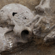 Ilustración para el artículo titulado Encuentran 17 esqueletos decapitados en un antiguo cementerio romano
